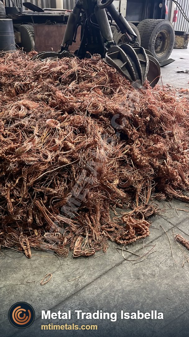 Copper wire being handled with a grapple